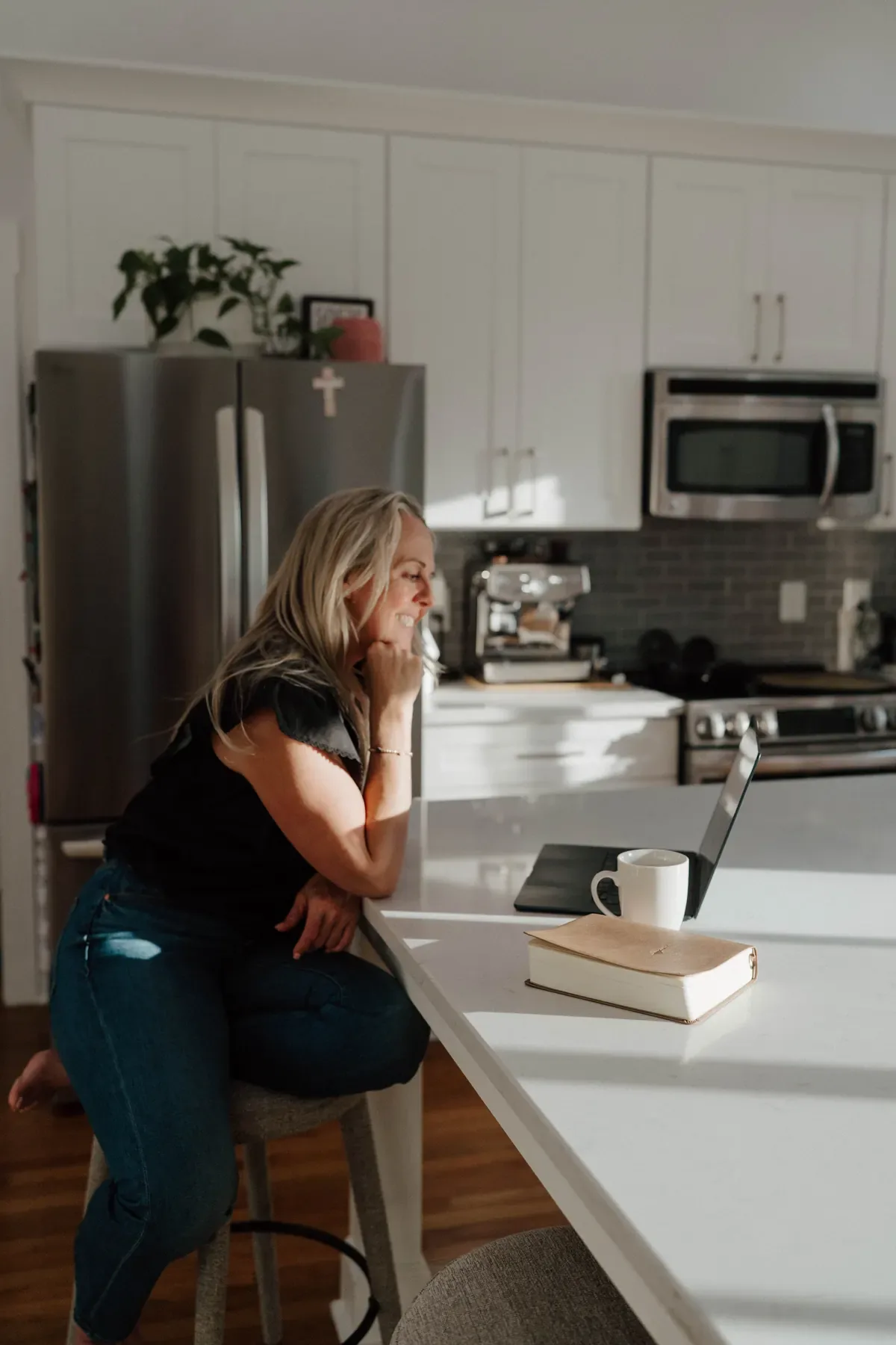 Dr. Martha Nessler writing at home