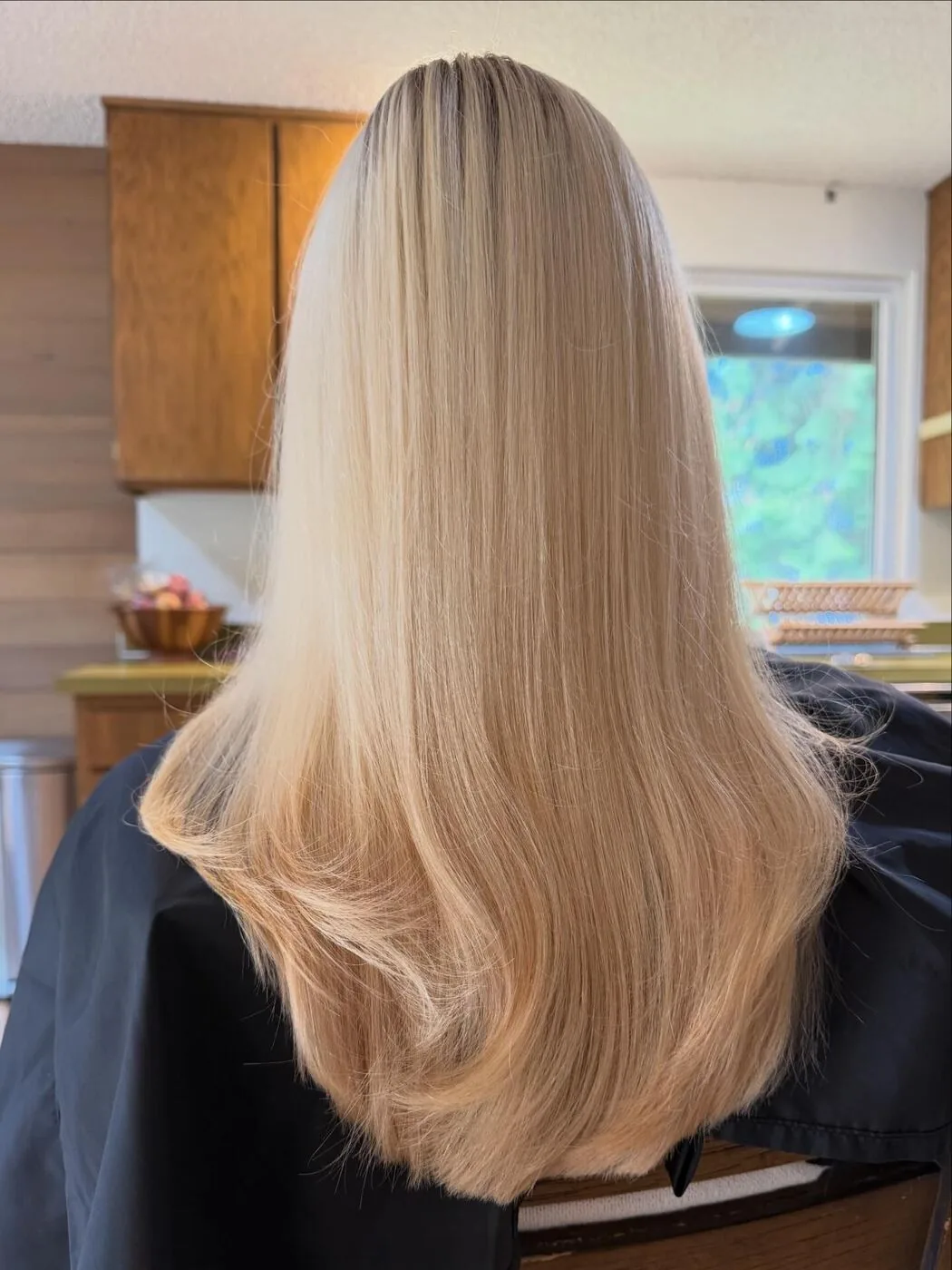 Before — softened brunette with grown-out highlights